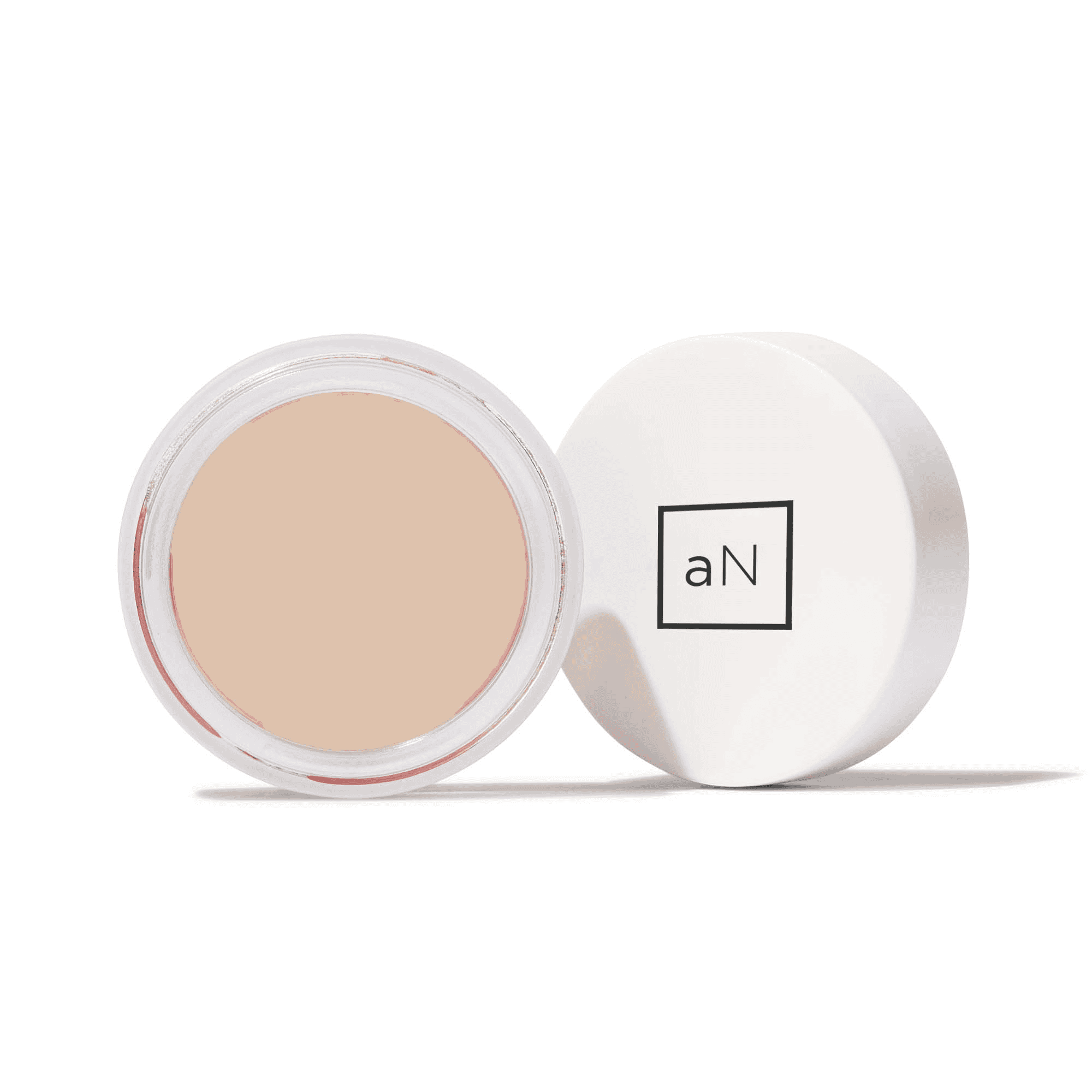 Au Naturale Zero Gravity C2P Foundation in Porcelain, shown in its current glass jar