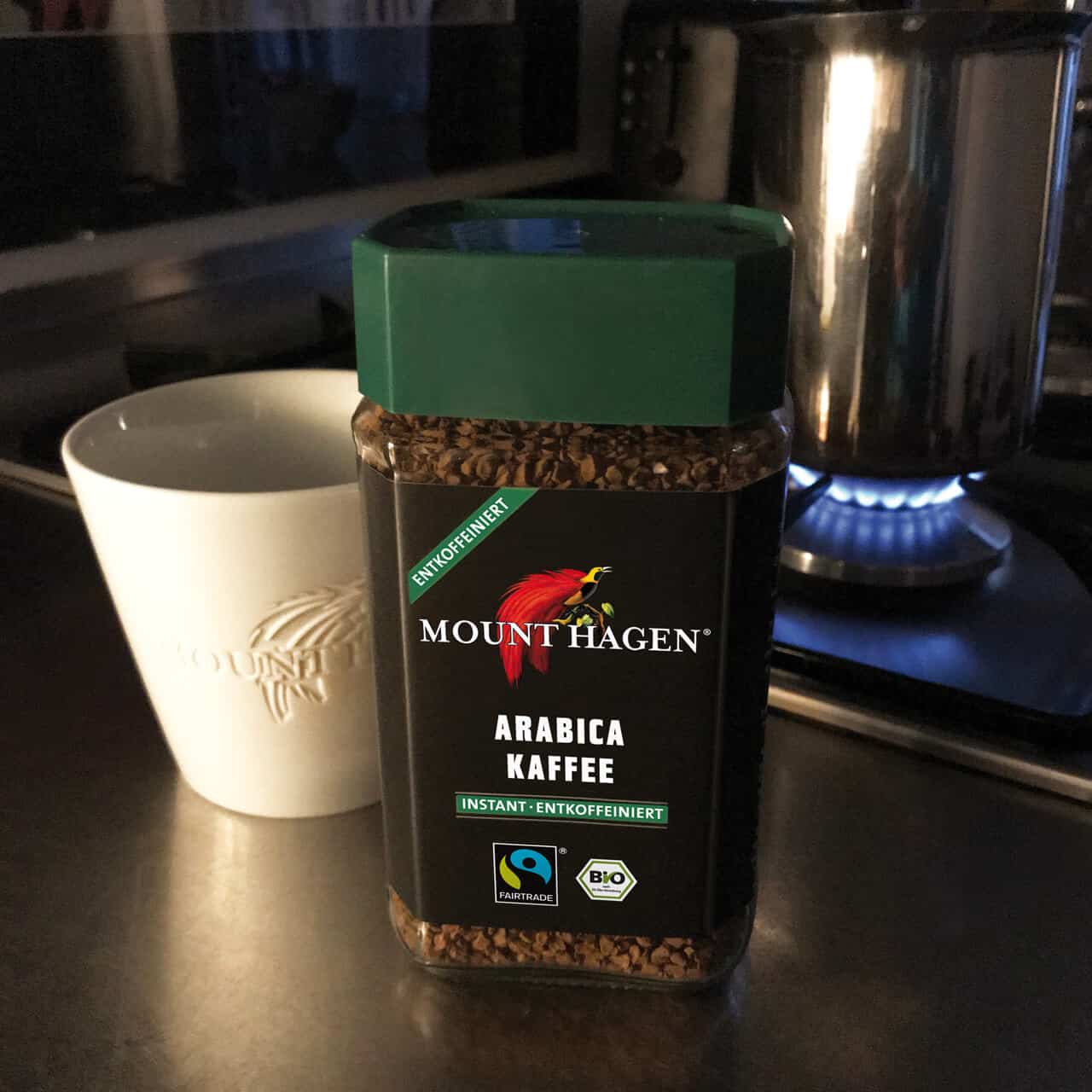 Mount Hagen instant decaf coffee jar beside a cup