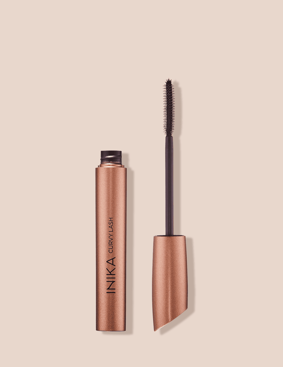 INIKA Organic Curvy Lash Mascara in Black, with its curved wand